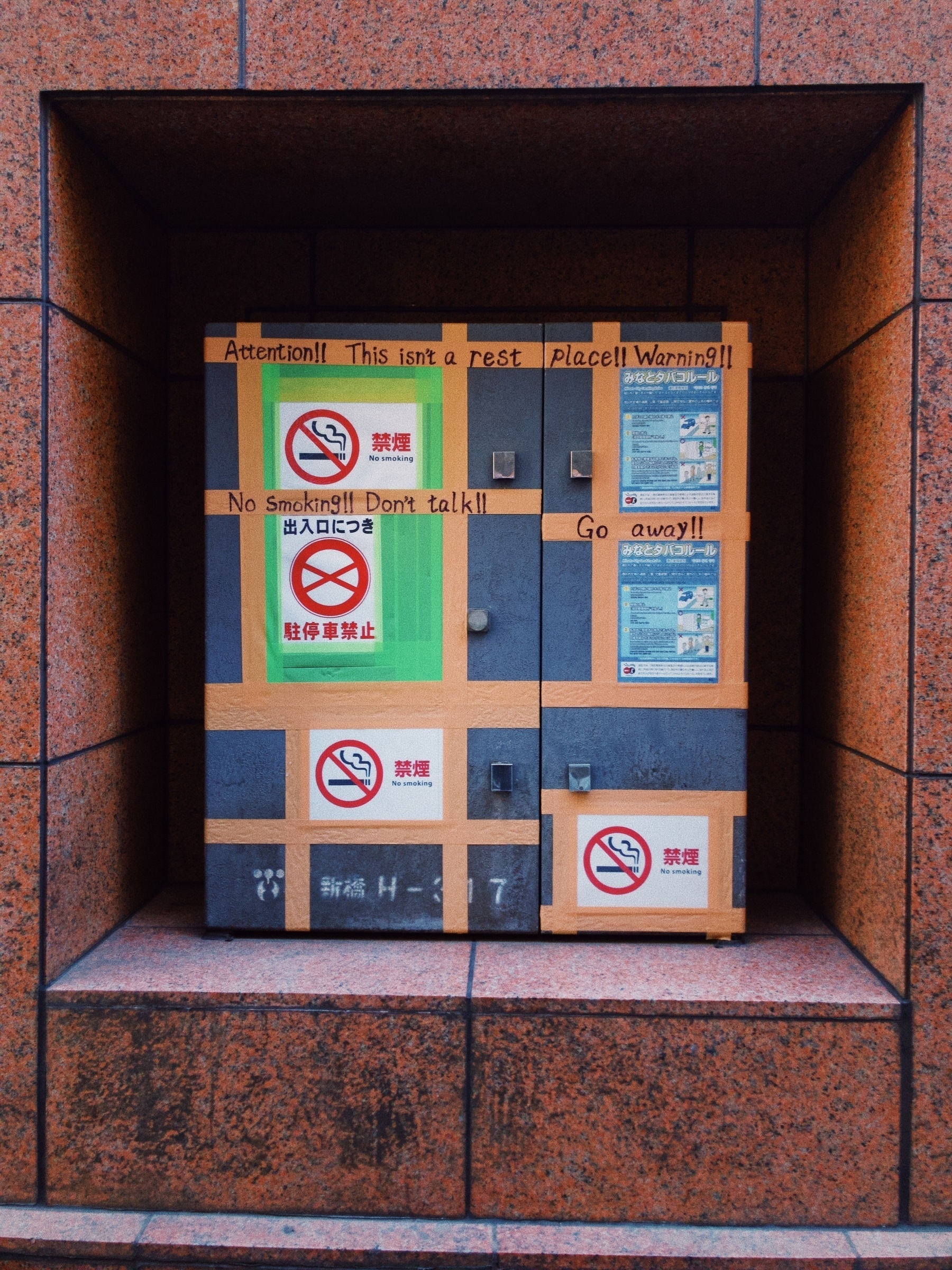 Makeshift English Non-smoking Signs on Duct Tape, photo by Rick Cogley